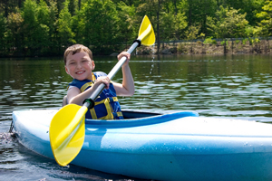 boy in kayak
