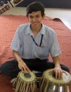 student playing drum