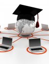 Graphic of graduation hat on top of a world globe that's connecting to multiple computers
